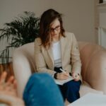 psychologist taking notes